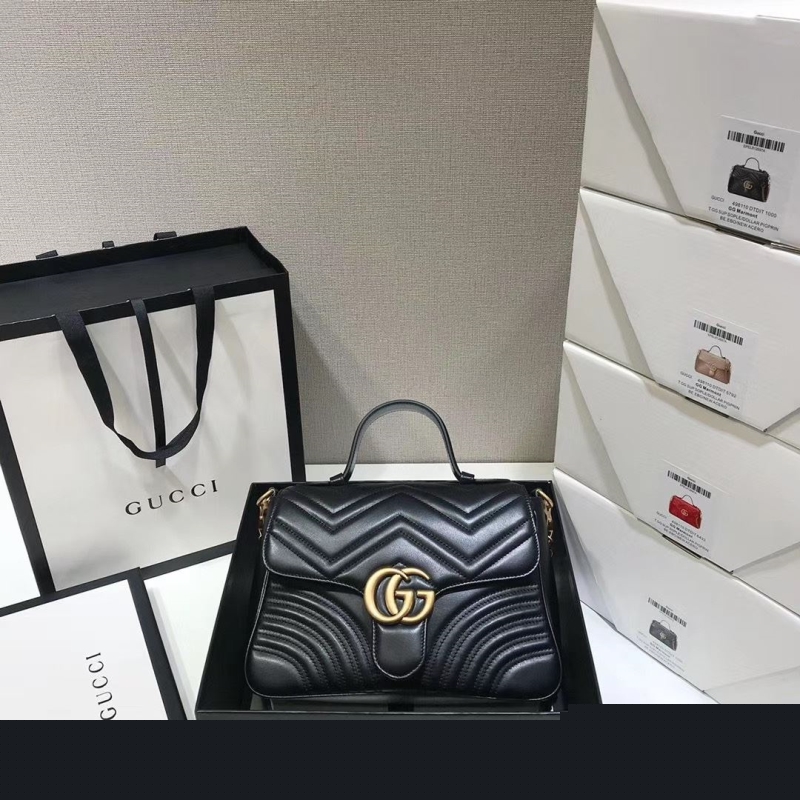 G*u*i top handle bags